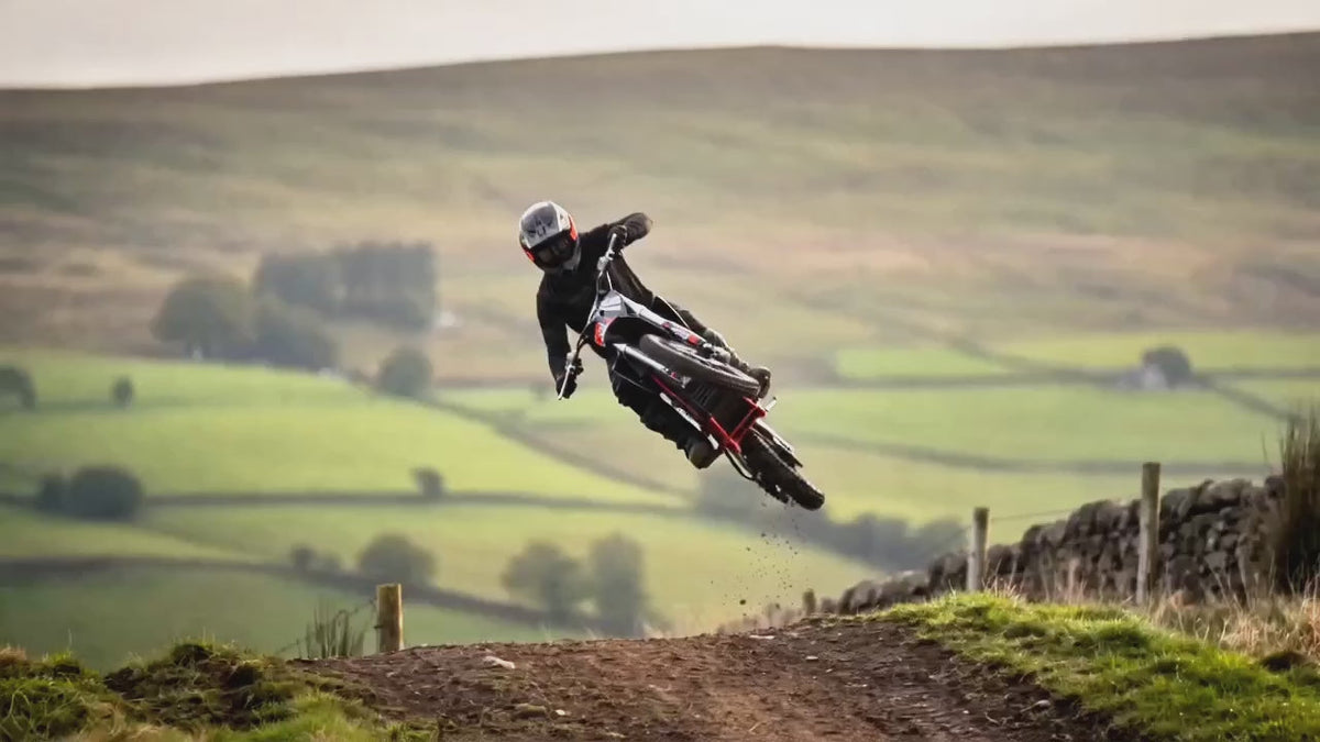 Dirt bike rider on an off-road track